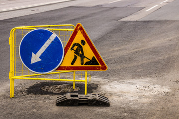 Traffic sign on the road. The city landscape