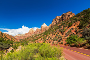 Bright scenery in Zion National Park, Utah, with deep blue skies and red rock formations