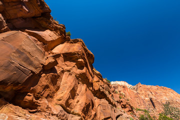 Bright scenery in Zion National Park, Utah, with deep blue skies and red rock formations