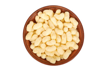 Light and delicious corn sticks isolated on white background, healthy sweet snack