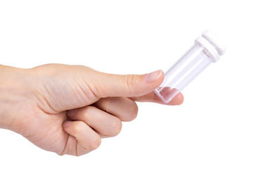 Empty plastic medical pharmaceutical sterile ampule bottle in hand isolated on the white background, transparent container