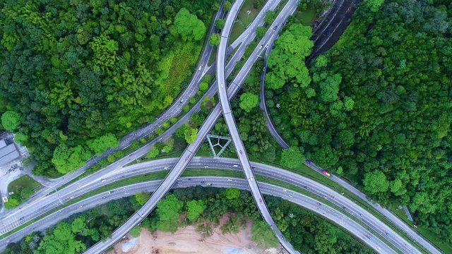 Aerial view. Multi level expressway constructed in the midst of beautiful landscape.