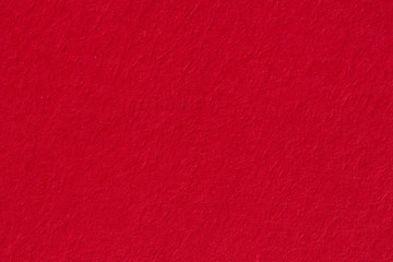 Close up of red paper texture, can be used as a background.
