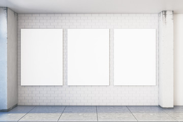 Modern white brick interior with empty posters