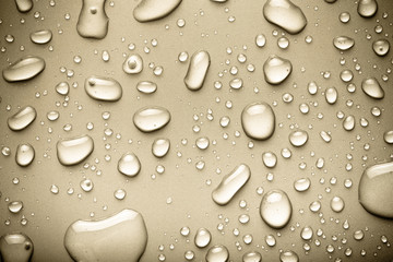 Drops of water on a color background. Gray. Toned