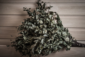 Equipment for sauna in light wooden cozy interior. Toned