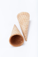 Empty sugar waffle cones for the ice cream isolated on white background