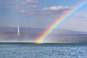 Naklejka na ściany i meble Rainbow over Lake Geneva in drops of fountain