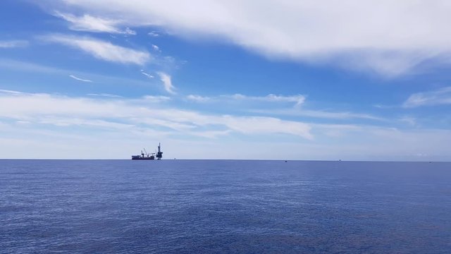 Tender assisted drilling rig in the middle of the ocean view from the crew boat
