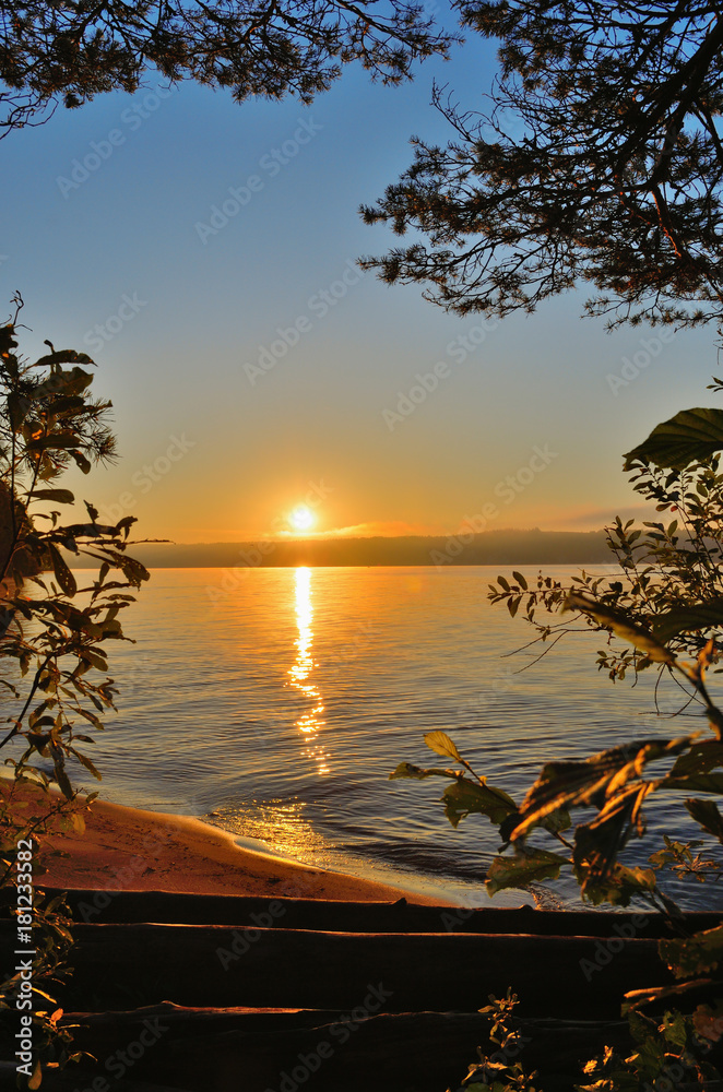 Wall mural Morning, sunrise, mist on the river, the path from the sun.