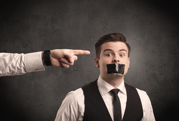 Business hand pointing at employee