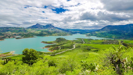 Spectacular aerial view of Lake Zahara from Castle of Zahara de la Sierra, a famous village de la Ruta de los Pueblos Blancos, white villages, between Cadiz and Malaga, Andalusia, Spain. © bennymarty