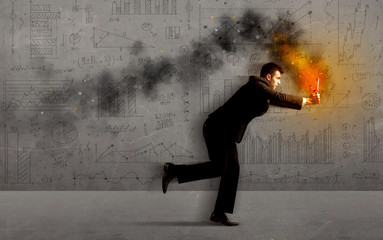 Running business man with fire laptop