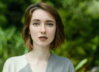 Portrait of beautiful sensual woman with freckles.