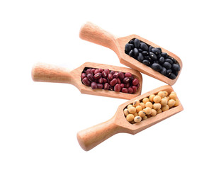 Yellow, red and black nuts isolated on a white background.