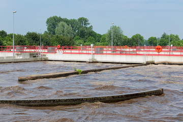 Sewage treatment plant. After primary sedimentation is the secondary basin for activating and...