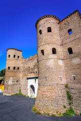 Fototapeta na wymiar Porta Asinaria and guard Towers on the Rome walls,Roma,Italy