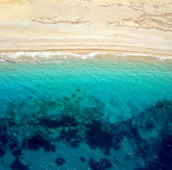 Top view of a deserted beach. The greek coast of the Ionian Sea