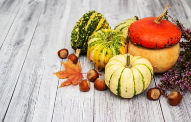 Pumpkins with autumn leaves