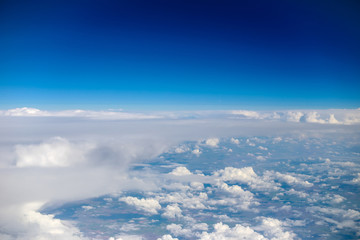Fototapeta na wymiar Fly above the clouds