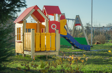 Brand new playground finished for the kindergarten. Wooden play houses, various attractions for kids to enjoy. 
