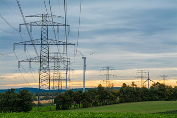 Old power source versus new, classic power distribution and wind power, Austria, Europe