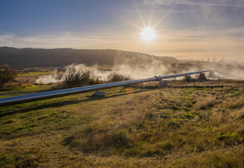 Geothermal Pipe in Landscape with Steam