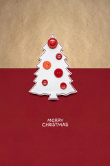 Merry christmas / Creative concept photo of christmas tree made of paper and buttons on red brown...
