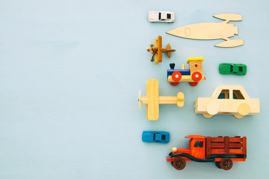 Set of various cars and airplanes toys. Top view image.