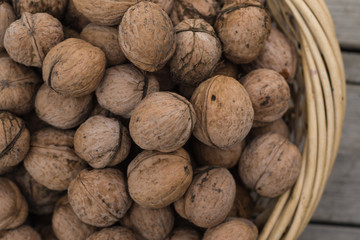 Voloshsky walnut on an old wooden background