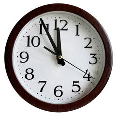 Fototapeta na wymiar wall clock shows midnight (noon), isolated white