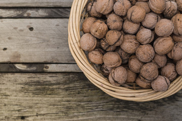 Voloshsky walnut on an old wooden background