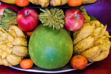 Fruit and vegetable offerings for the gods of chinese shrine in Thailand