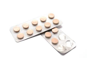 Obraz na płótnie Canvas two packs of pills isolated on white