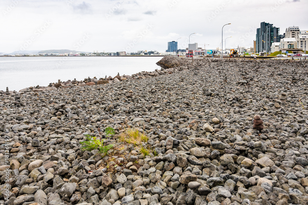 Poster stone beach at Atlantic coast in Reykjavik city