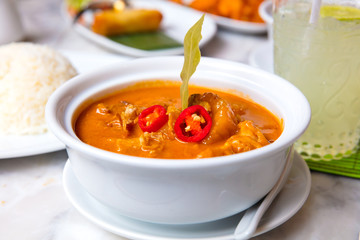 Closeup Of Massaman Duck Curry Served In Bowl