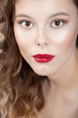 Young beautiful girl with clean perfect skin with red lipstick