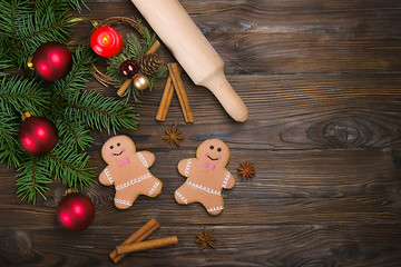 Christmas and New Year Gingerbread man Cookie on wooden table top view