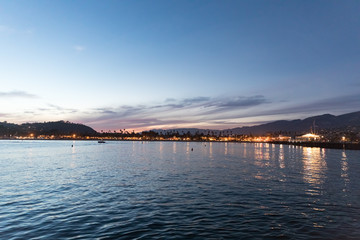 beautiful view of city from a boat at sunset time