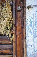 Hanging bunches of medicinal herbs. Dried herbs and flowers in the village