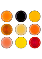 Fresh organic juice glasses top view mix on white