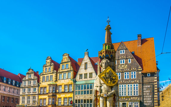 Colourful facades with bremer roland statue in Bremen, Germany.