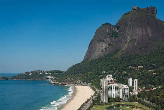 View of Sao Conrado Neighborhood and Beach with Pedra da Gavea Mountain in the Horizon, in Rio de Janeiro, Brazil