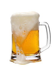 Cold beer in glass isolated on white background