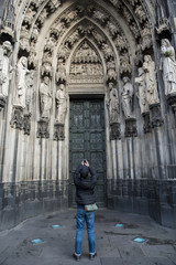 Fototapeta na wymiar Tourist is take photo in Dome of Cologne, Germany