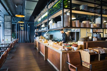Selbstklebende Fototapete Restaurant Bewegungsköche einer Restaurantküche