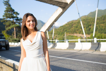 Young woman in a white dress