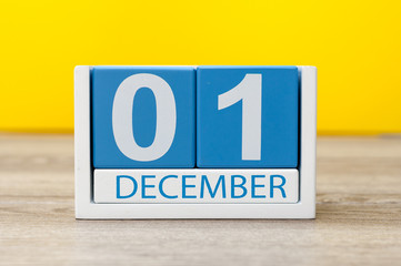 December 1st. Image of december 1 wooden color calendar on yellow background