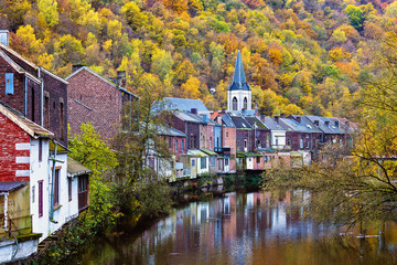 Vesdre river and church of Saint Francois Xavier in Belgian town of Chaudfontaine, Wallonia