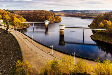 Fototapeta na wymiar View of Gileppe Dam, an arch-gravity dam and its two 2.8m wells on the Gileppe river in Jalhay, Liege province, Wallonia, Belgium